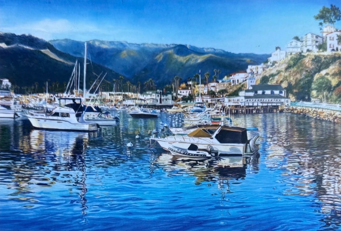 Realist painting of white yachts reflected in deep blue water in Avalon harbor, with green mountains and hillside homes behind
